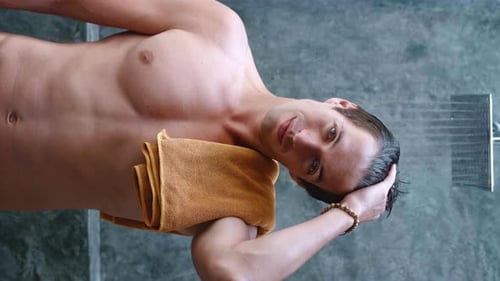 Man Taking Shower in Vertical Format