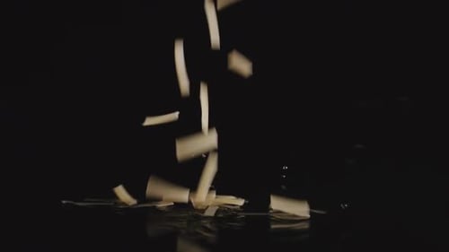 Noodles falls into water - Slow Motion