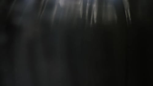 Abstract Bokeh Light Streaks on Dark Background