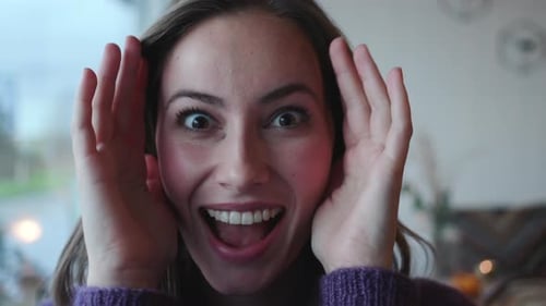 Surprised and Excited Woman Smiling at Camera