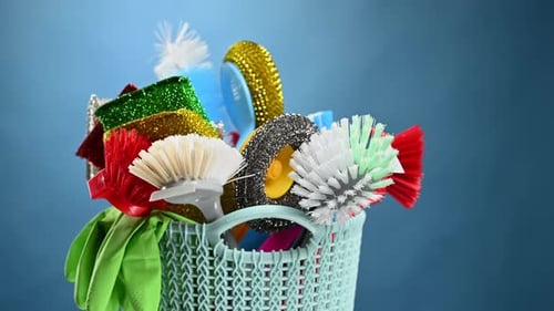 Colorful Cleaning Supplies in a Blue Basket
