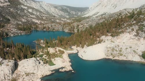 Aerial View Top View Drone Flying Over Beautiful Blue and Green Mountain Lake