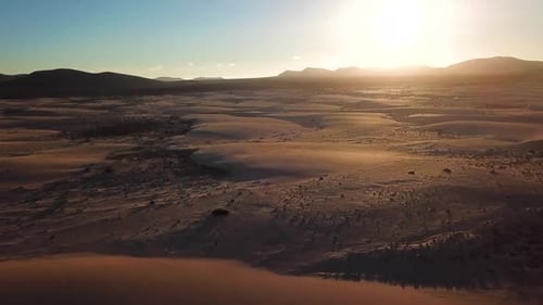 Above view of desert dunes - concept of wild adventure travel destination