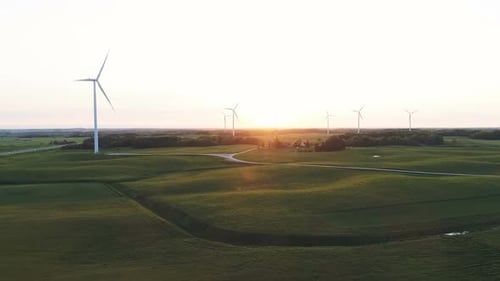 Wind Turbines in Rural Landscape at Sunset
