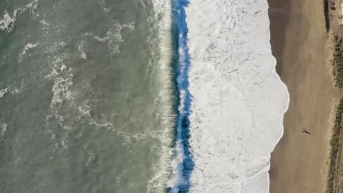 Stormy Water of the Sea and Beach