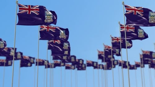 Falkland Islands Flags Waving Dynamically Against Blue Sky
