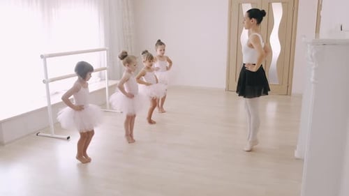 Young Students Ballerinas in Choreography Class of Ballet School