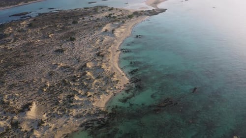 Aerial view of Wild Beach. Flying above Rocky Coastline