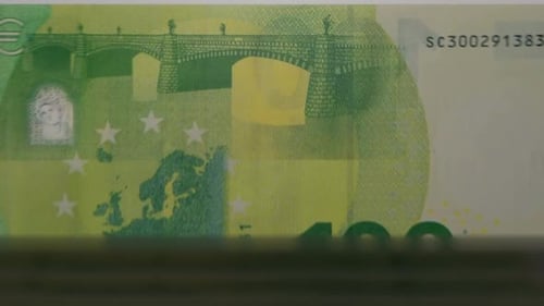 100 Euro Banknotes Counting in a Machine Close-Up