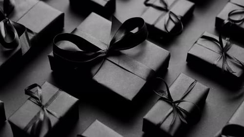 Monochromatic Gifts Wrapped in Black with Satin Ribbons