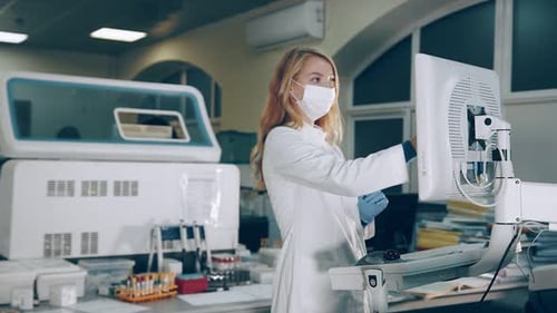 Woman Scientist Working in Medical Laboratory