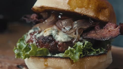 Close Up of Hamburger with Bacon and Onions