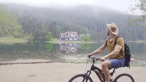 Cycling in the area with a lake in nature.
