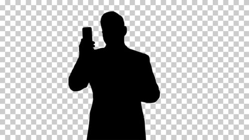Silhouette businessman using , Alpha Channel