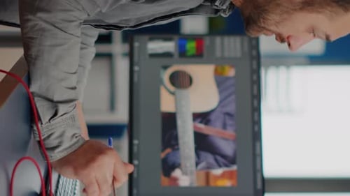 Young Adult Man Working at Computer