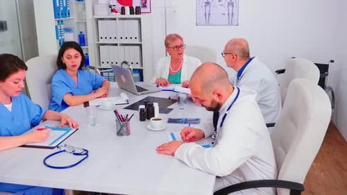 Medical Professionals Meeting in Bright Clinic Office