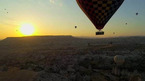 Hot Air Balloons Soar at Sunrise