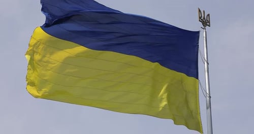 Flag with Blue and Yellow Blowing in Wind