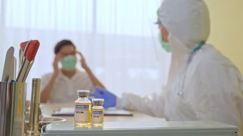 Young male patient visit hospital medical clinic for a check up consult with female doctor in clinic