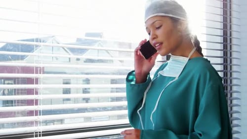 Nurse talking on mobile phone