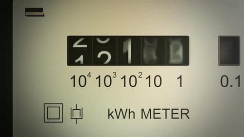Analog electricity meter showing household consumption in kilowatt hours.