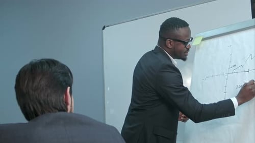 Business Presentation with Graphs Inside the Office