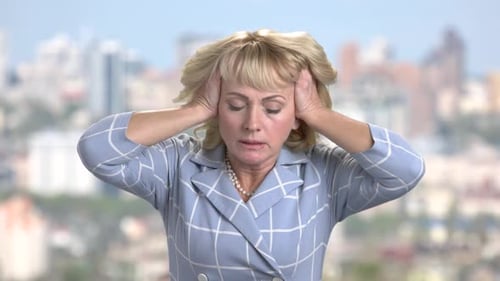 Stressed Woman Pulling Out Her Hair.