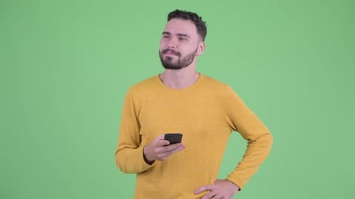 Man Typing on Phone, Thinking on Green Screen