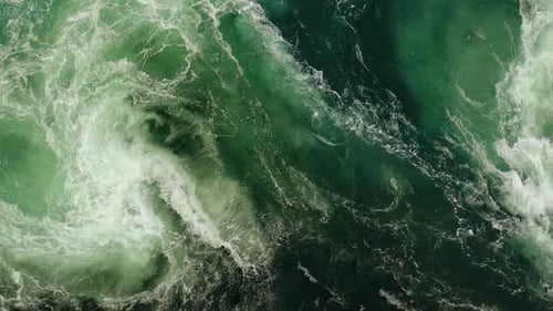 Waves of Water of the River and the Sea Meet Each Other During High Tide and Low Tide