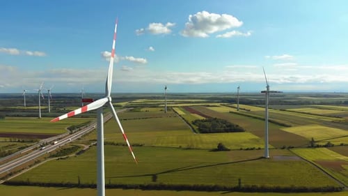 Aerial View of Wind Turbines Farm in Field. Austria. Drone View on Energy Production