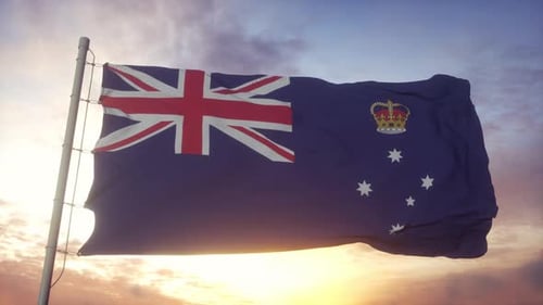 Victorian State Flag Waving Against a Sunset Sky