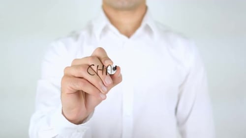 Man Writes Change Management on Clear Surface