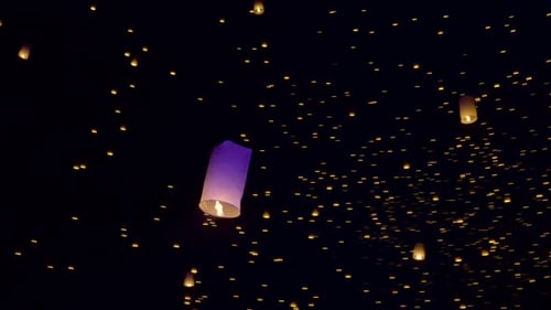 Sky Lanterns Fly Into The Night Sky