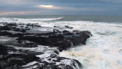Aerial view of waves on rocky Oregon coast