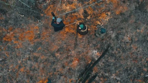 Soldiers of World War II Walking in the Forest and Preparing the Place for the Overnight Stay