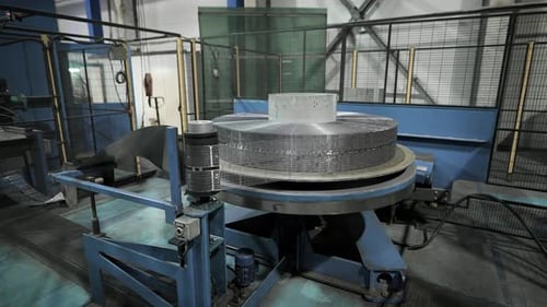 Línea automática para estampar tiras de plomo