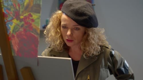 Close Up, Woman in Beret Paints a Picture