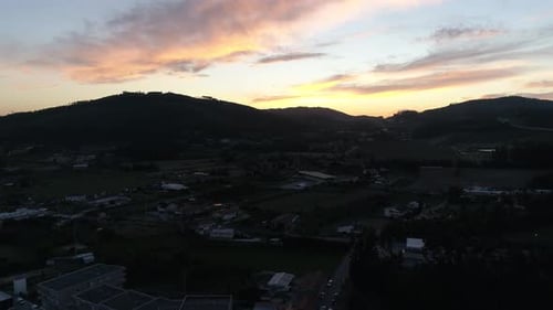Aerial View of Residential Houses in Suburban Rural Area at Sunset