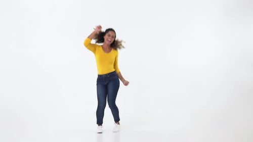 Woman Dancing Energetically Against White Background
