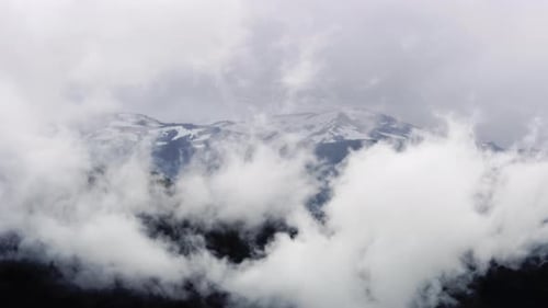 Clouds Almost Covering Mountain Peak