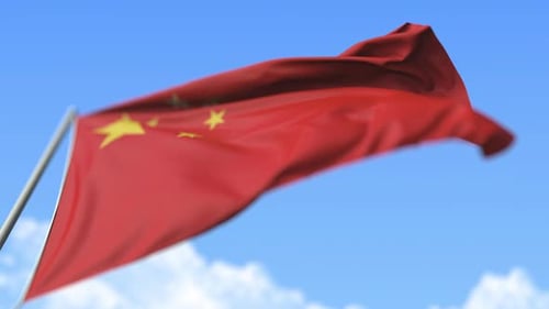 China Flag Waving on a Blue Sky