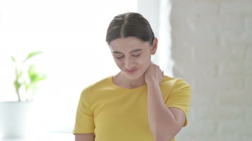 Woman Relieving Neck Pain With Massage