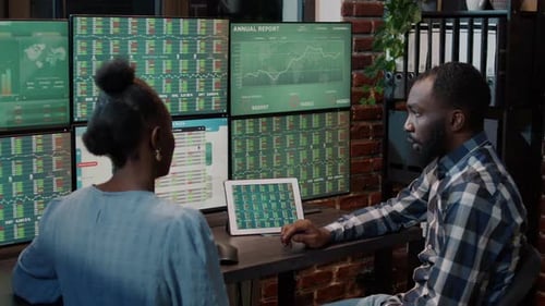 Business Partners Brainstorming Ideas to Develop Stock Market Growth