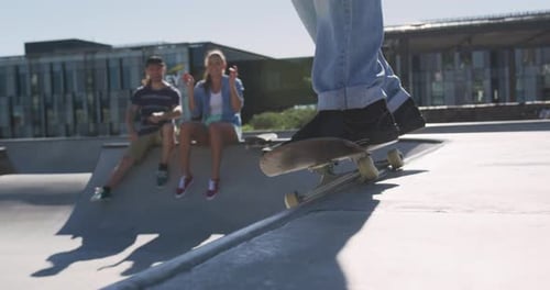 Young Adults Relaxing at Skate Park