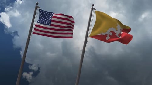 Flags of USA and Bhutan Waving in the Wind