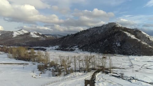 Snowy Mountains Landscape Aerial View in Winter
