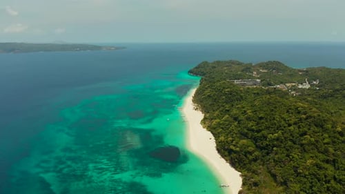 Tropical Beach and Turquoise Lagoon Water