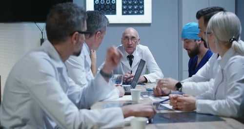 Medical Team Meeting to Discuss Health Findings