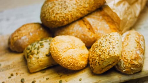 Assortment of Artisan Breads and Rolls on Board