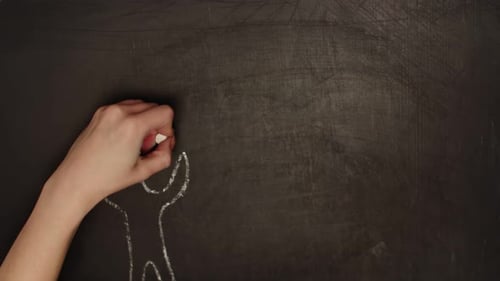 Drawing a Recycle Symbol on Chalkboard